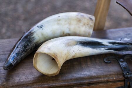 Close up view of an animal drinking horn at a medieval fair.のeditorial素材