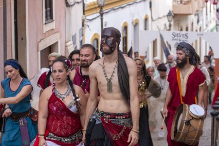 SILVES, PORTUGAL - August 11th, 2019 : Medieval costume characters in Medieval fair event.のeditorial素材