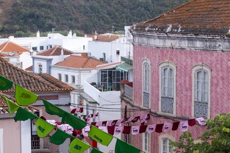View of Medieval flags in festival in a park.のeditorial素材