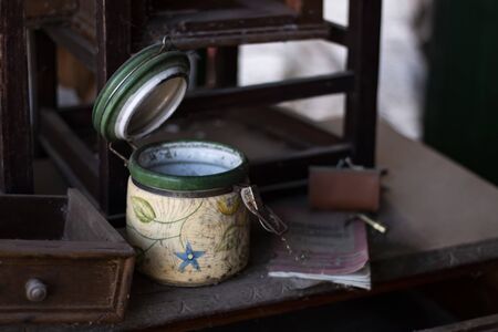 Close view of old abandoned objects on a crippled house.