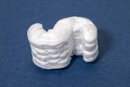 Polystyrene or white polystyrene packing pieces used for minimize bumps in transportation of goods.