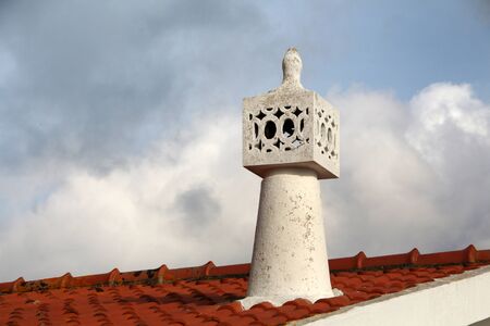 Close view of the white traditional and beautiful portuguese chimneys.の写真素材