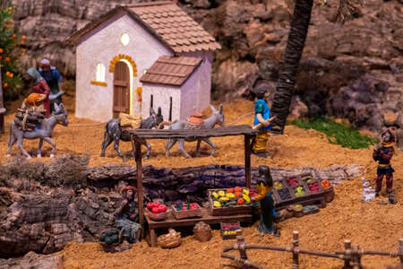 VILA REAL SANTO ANTONIO, PORTUGAL - 28th DECEMBER 2019: Christmas Nativity scene exhibition of many figurines depicting daily life across different business and religious activities.のeditorial素材