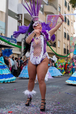 LOULE, PORTUGAL - FEBRUARY 2020: Colorful Carnival (Carnaval) Parade festival participants on Loule...