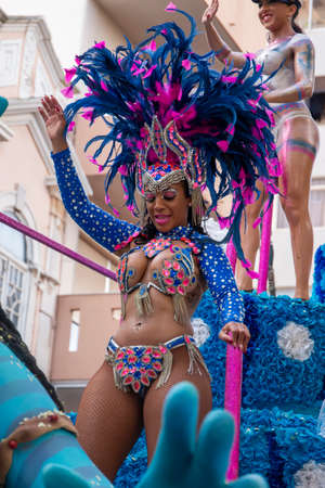 LOULE, PORTUGAL - FEBRUARY 2020: Colorful Carnival (Carnaval) Parade festival participants on Loule city, Portugal.のeditorial素材