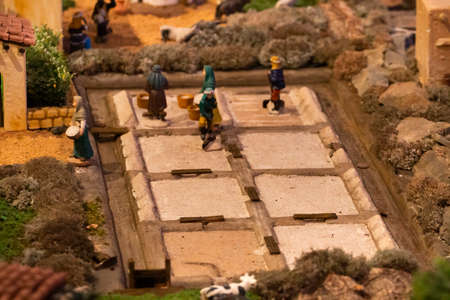 VILA REAL SANTO ANTONIO, PORTUGAL - 28th DECEMBER 2019: Christmas Nativity scene exhibition of many figurines depicting daily life across different business and religious activities.のeditorial素材