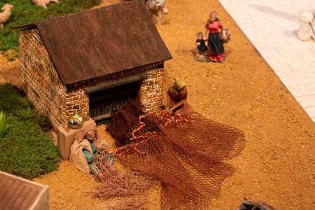 VILA REAL SANTO ANTONIO, PORTUGAL - 28th DECEMBER 2019: Christmas Nativity scene exhibition of many figurines depicting daily life across different business and religious activities.のeditorial素材