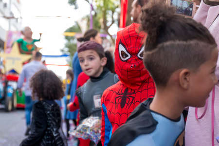 LOULE, PORTUGAL - FEBRUARY 2020: Colorful Carnival (Carnaval) Parade festival participants on Loule city, Portugal.のeditorial素材
