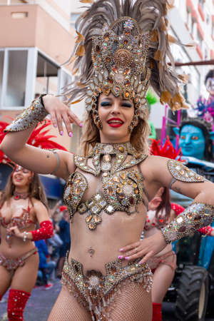 LOULE, PORTUGAL - FEBRUARY 2020: Colorful Carnival (Carnaval) Parade festival participants on Loule city, Portugal.のeditorial素材