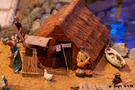 VILA REAL SANTO ANTONIO, PORTUGAL - 28th DECEMBER 2019: Christmas Nativity scene exhibition of many figurines depicting daily life across different business and religious activities.のeditorial素材