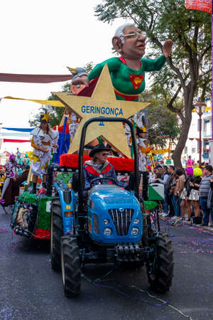 LOULE, PORTUGAL - FEBRUARY 2020: Colorful Carnival (Carnaval) Parade festival participants on Loule city, Portugal.のeditorial素材