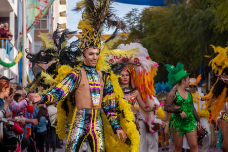 LOULE, PORTUGAL - FEBRUARY 2020: Colorful Carnival (Carnaval) Parade festival participants on Loule city, Portugal.のeditorial素材