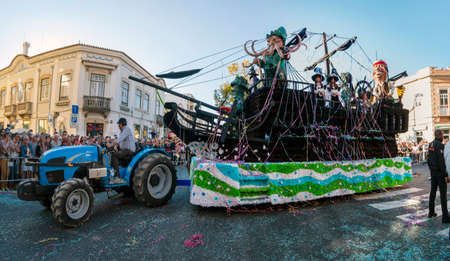 LOULE, PORTUGAL - FEBRUARY 2020: Colorful Carnival (Carnaval) Parade festival participants on Loule city, Portugal.のeditorial素材