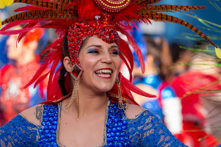 LOULE, PORTUGAL - FEBRUARY 2020: Colorful Carnival (Carnaval) Parade festival participants on Loule city, Portugal.のeditorial素材