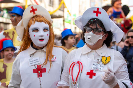 LOULE, PORTUGAL - FEBRUARY 2020: Colorful Carnival (Carnaval) Parade festival participants on Loule...