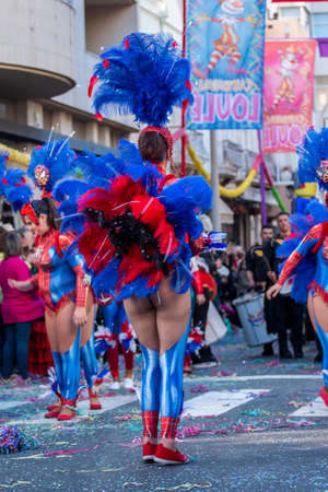 LOULE, PORTUGAL - FEBRUARY 2020: Colorful Carnival (Carnaval) Parade festival participants on Loule city, Portugal.のeditorial素材
