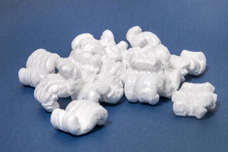 Polystyrene packing pieces used for minimize bumps in transportation of goods.