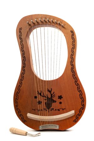 stringed lyre musical instrument isolated on a white background.