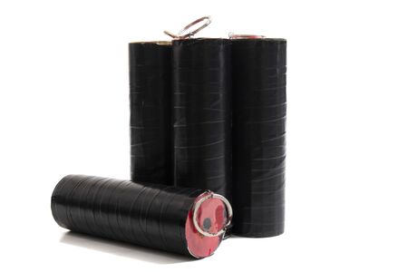Close view of group of smoke grenades on white background for paintball games and special effects.