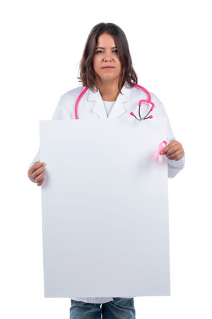 Caucasian doctor woman holding white board on a white background.の写真素材
