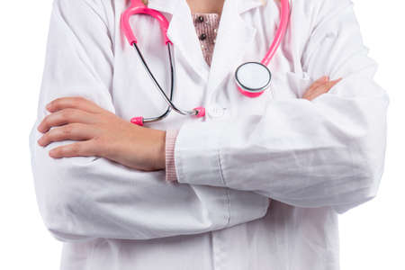Caucasian doctor woman with pink stethoscope on a white background.の写真素材