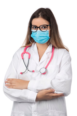 Caucasian doctor woman with pink stethoscope and mask on a white background.の写真素材