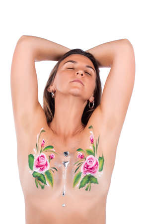 girl with painted artwork of flowers on a white background.の写真素材