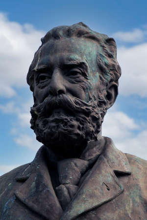 FARO, PORTUGAL: 20th june 2021 - Garden Manuel Bivar bust statue of Joao de Deus poet in Faro city, Portugal.のeditorial素材