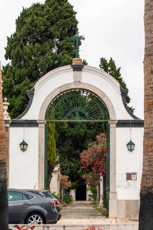 FARO, PORTUGAL - 20th june 2021: Close up view of the entrance to the portuguese cemetery of Faro, Portugal.のeditorial素材