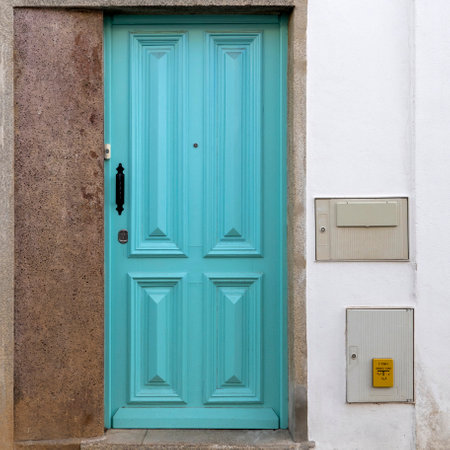 Typical architecture of Algarve vintage style doors, located in Olhao, Portugal.