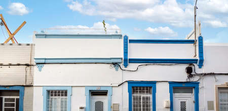 Typical architecture of Algarve vintage style buildings, located in Olhao, Portugal.