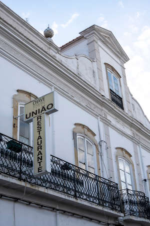 SAO BRAS DE ALPORTEL, PORTUGAL - 23rd JANUARY 2022: Small town Sao Bras de Alportel village restaurant in the center plaza that serves local food located in the Algarve region, Portugal.のeditorial素材