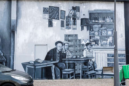 OLHAO, PORTUGAL - 13th FEBRUARY 2022: Beautiful graffiti on Olhao city done by local artists,...