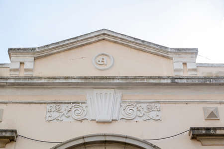 Typical architecture of Algarve rustic buildings with intricate designs of platbands.の写真素材