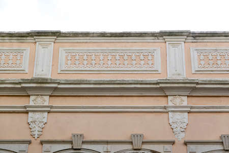 Typical architecture of Algarve rustic buildings with intricate designs of platbands.の写真素材