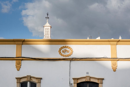 Typical architecture of Algarve rustic buildings with intricate designs of platbands.の写真素材
