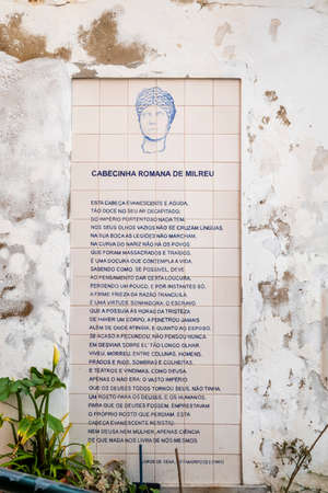 ESTOI, PORTUGAL - 23rd JANUARY, 2022: Poem verse about Milreu written by Jorge de Sena in Estoi village, Portugal.のeditorial素材