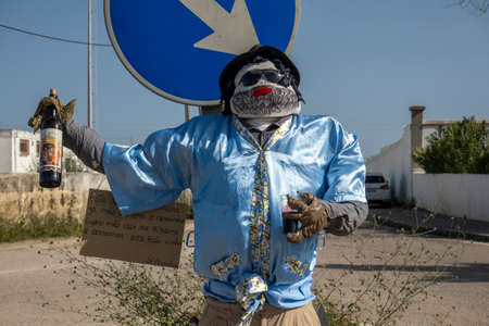 TAVIRA, PORTUGAL - MAY 1, 2022: Ancient tradition of handmade dolls called Maios / Maias, celebrating the arrival of Spring, located on the Algarve region, the south of Portugal.のeditorial素材