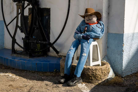 TAVIRA, PORTUGAL - MAY 1, 2022: Ancient tradition of handmade dolls called Maios / Maias, celebrating the arrival of Spring, located on the Algarve region, the south of Portugal.のeditorial素材