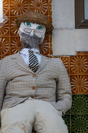 SANTA RITA, PORTUGAL - MAY 1, 2022: Ancient tradition of handmade dolls called Maios / Maias, celebrating the arrival of Spring, located on the Algarve region, the south of Portugal.のeditorial素材