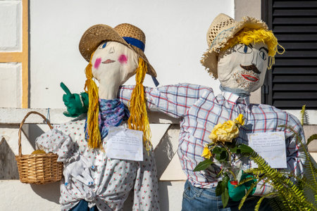 SANTA RITA, PORTUGAL - MAY 1, 2022: Ancient tradition of handmade dolls called Maios / Maias, celebrating the arrival of Spring, located on the Algarve region, the south of Portugal.のeditorial素材