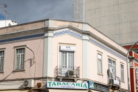 LOULE, PORTUGAL - 27th FEBRUARY 2022: Typical architecture of Algarve rustic buildings with intricate designs of platbands.のeditorial素材