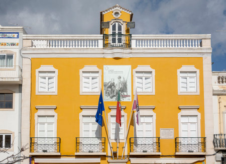 LOULE, PORTUGAL - 27th FEBRUARY 2022: Typical architecture of Algarve rustic buildings on the downtown area of Loule city.のeditorial素材