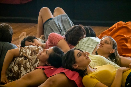 LOULE, PORTUGAL - 25th JUNE 2022 - Contemporary dancing and singing teens doing a performance group on a local theater.のeditorial素材