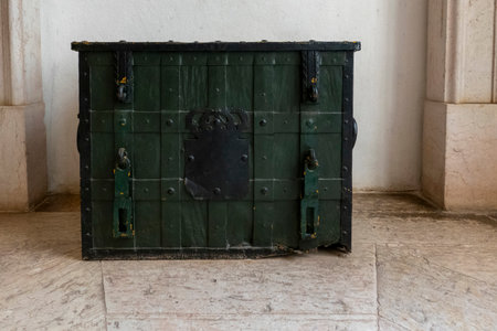 Close view of an old and sturdy medieval crate or chest.の写真素材