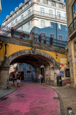 LISBON, PORTUGAL, 28th JUNE 2022: Rua Nova do Carvalho street, also known as Pink Street, a popular tourist attraction in the neighborhood of Cais do Sodre located in Lisbon city.のeditorial素材