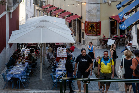 LISBON, PORTUGAL, 28th JUNE 2022: Restaurant area near a location called Escadinhas do Duque, located near Rossio station, in Lisbon, Portugal.のeditorial素材