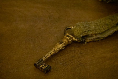 MAFRA, PORTUGAL - 29th JUNE 2022: Close up view of an Old Golden rusty key.のeditorial素材