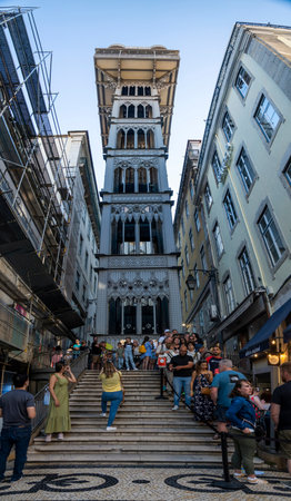 LISBON, PORTUGAL, 28th JUNE 2022: Tourists wait in line to enter the vintage landmark Santa Justa lift elevator located in Lisbon, Portugal.のeditorial素材