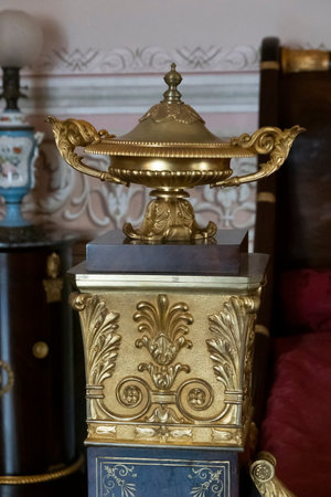MAFRA, PORTUGAL - 29th JUNE 2022: Close up view of an ancient highly detailed wooden bed at display on the convent of Mafra, Portugal.のeditorial素材